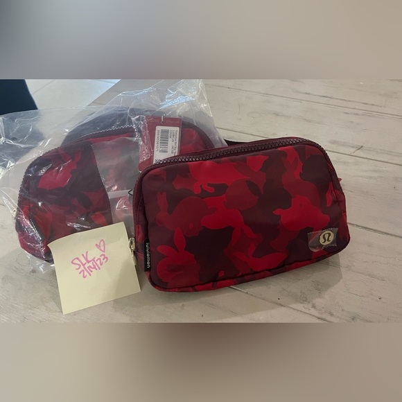 lululemon athletica Handbags - Lululemon RED LUNAR EBB NWT - great Easter basket gift. Sold out everywhere.